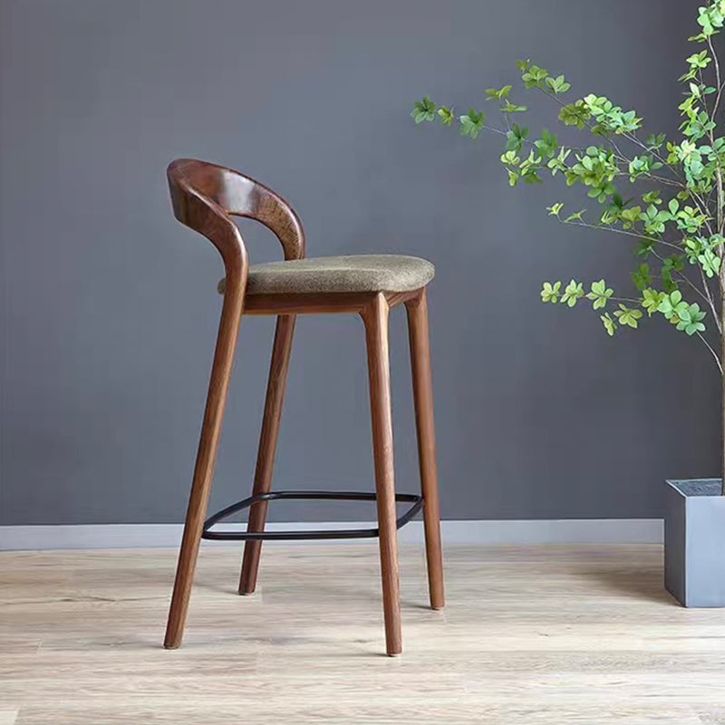 Modern solid wood bar stool with curved backrest and upholstered seat for kitchen island and home bar